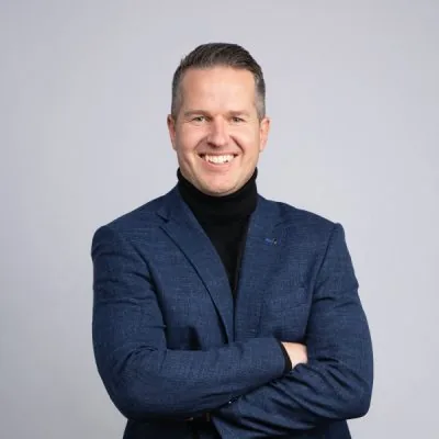 Porträtt av Roger Roos.