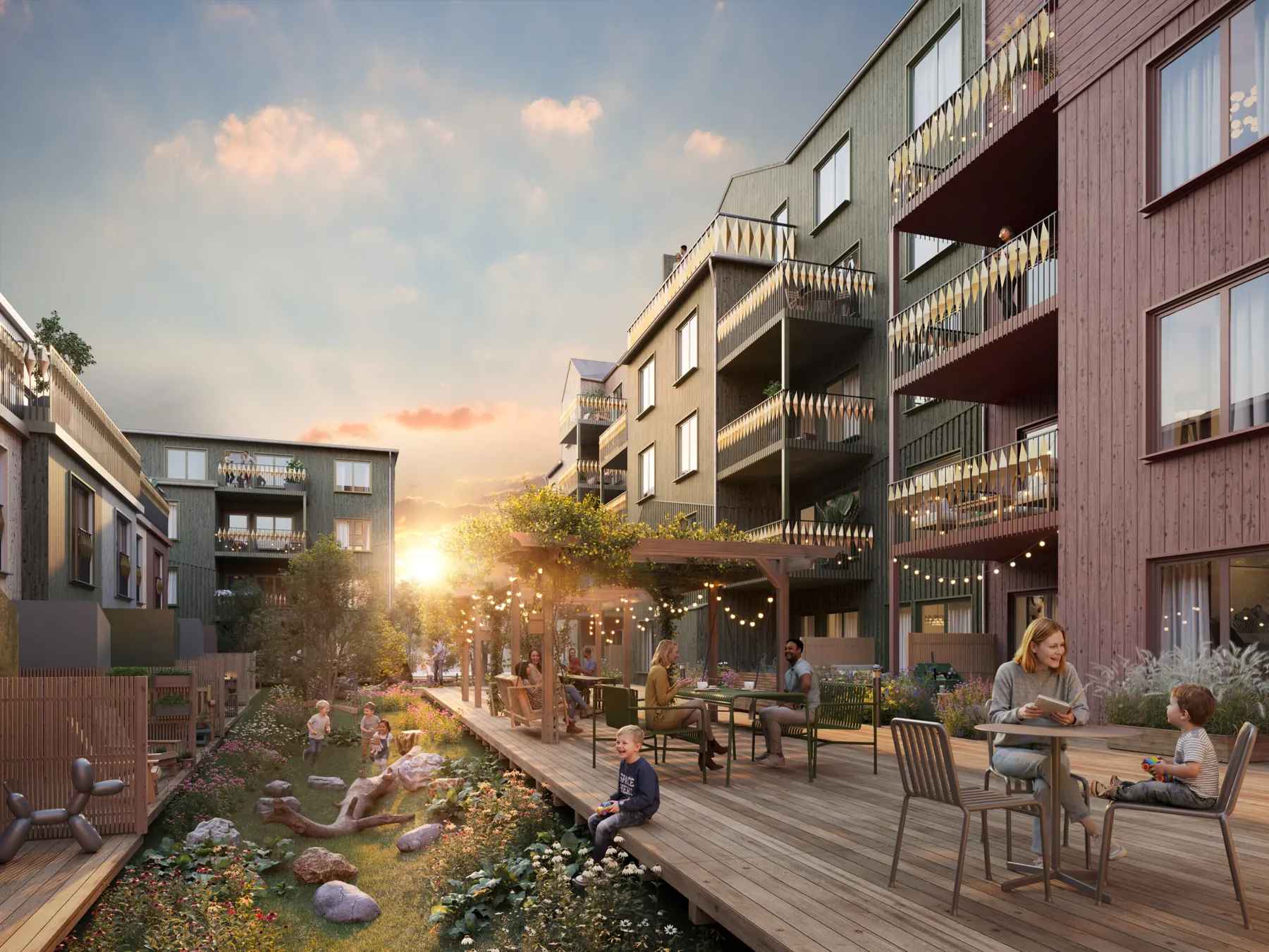 Innergård i kvarteret med bryggor, grönska och kvällssol.
